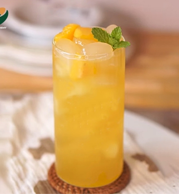 A glass of palm-seed pineapple tea