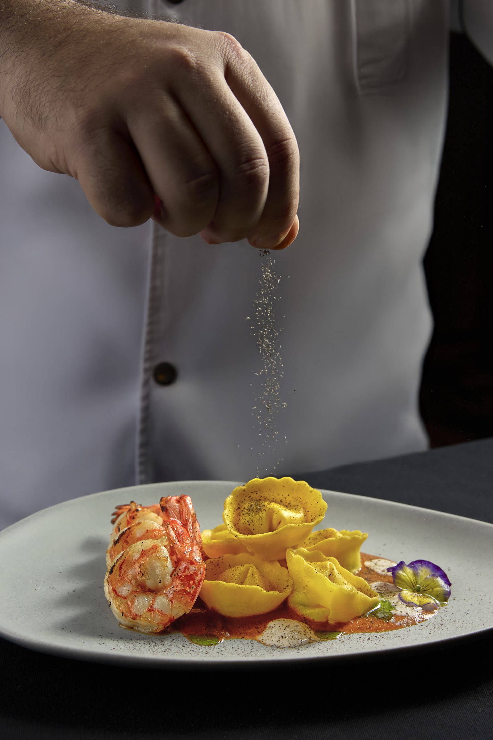 The chef's hand seasoning cappellacci