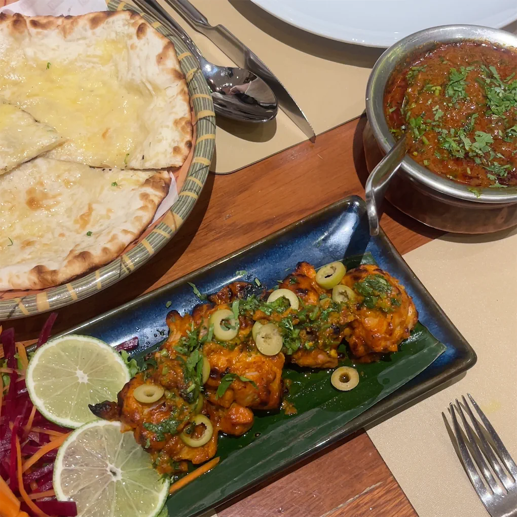 A tandoori platter with garlic naan