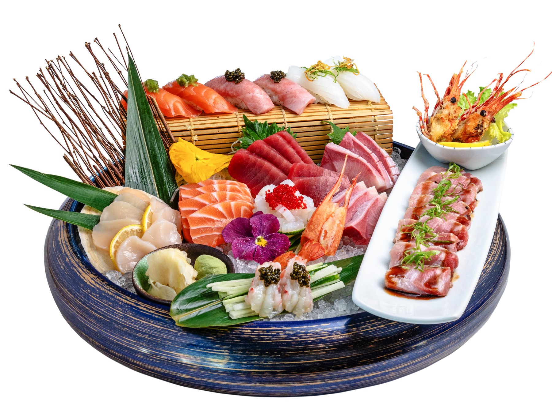 A generous sashimi platter with nigiri, tuna, shrimp and scallops