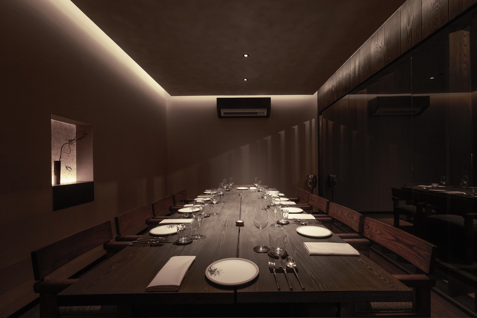 The private dining room with a long set table