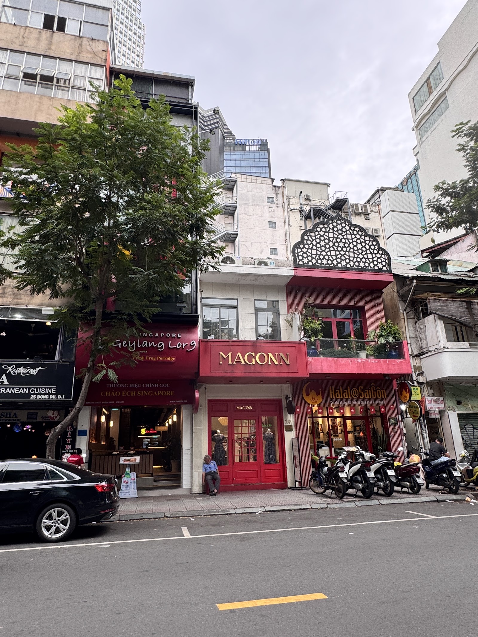 The Geylang Lor 9 storefront by night — Đồng Du, District 1