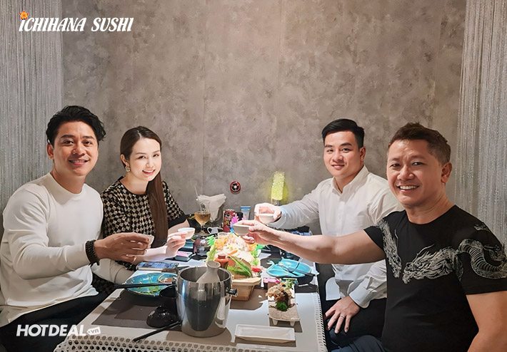 Diners raising their glasses in Ichihana's dining room