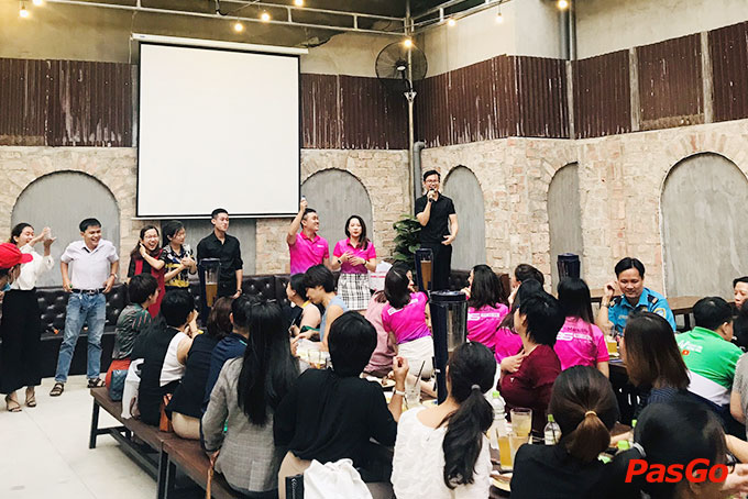 A lively night party at Lao Tru: beer towers, the projector screen