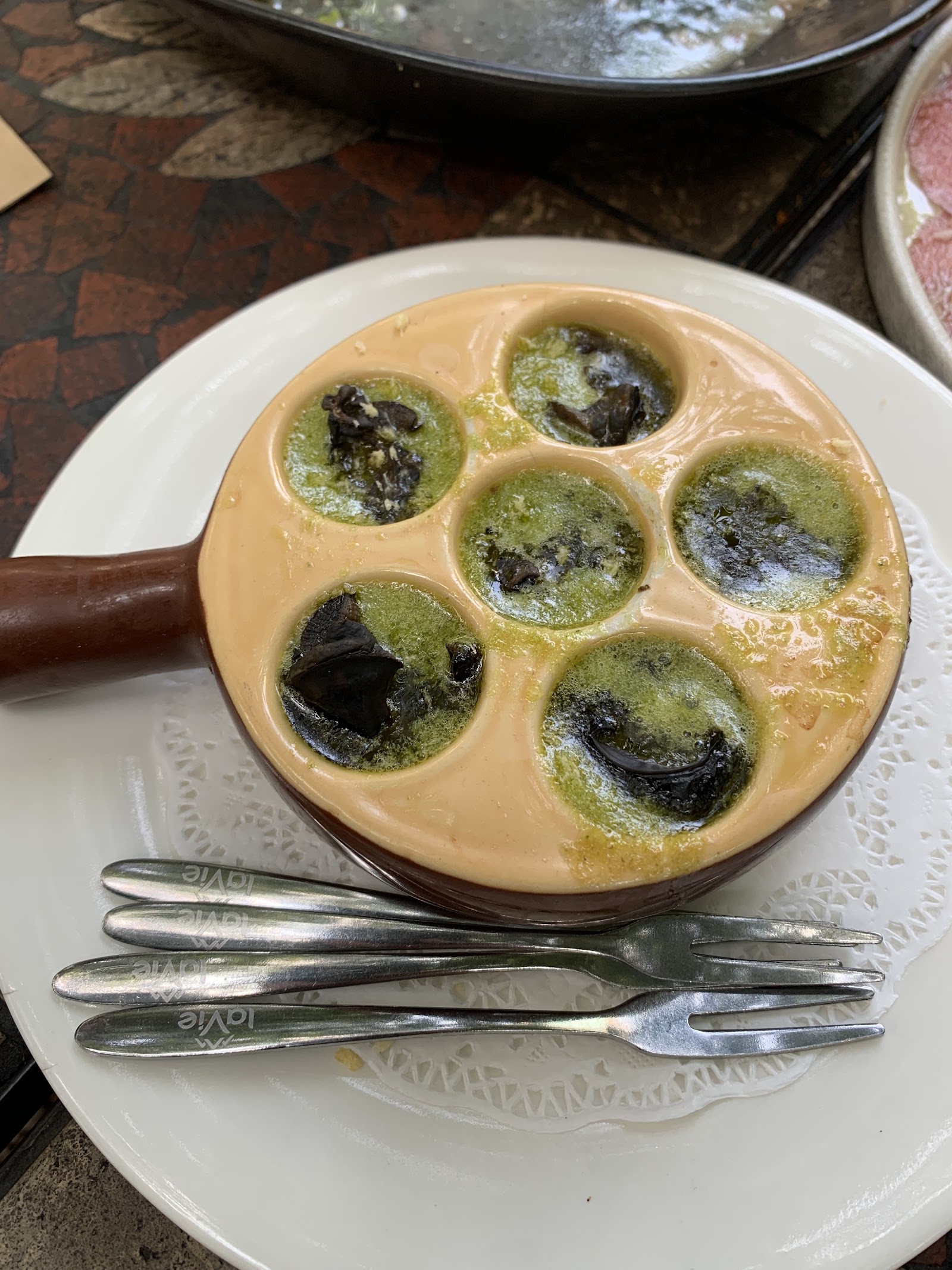 A plate of escargots in the shell