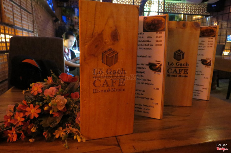 The venue's real wooden price boards with the kiln logo