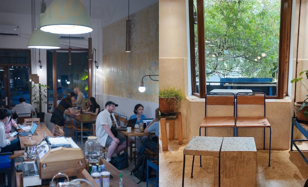 Manki — green enamel pendant shades over the wooden bar