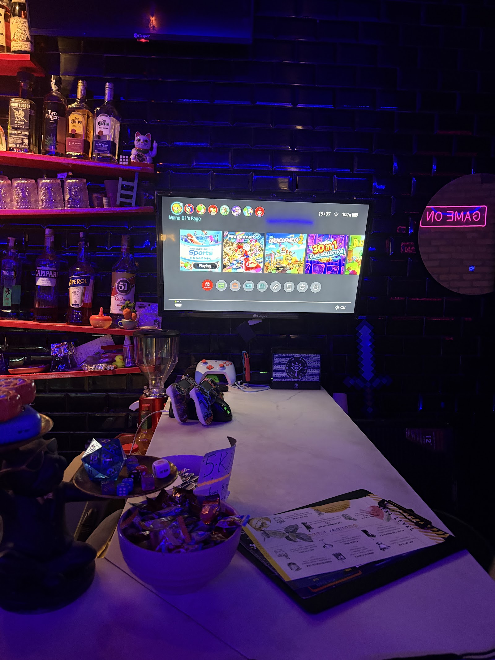 The bar counter with a Nintendo Switch screen
