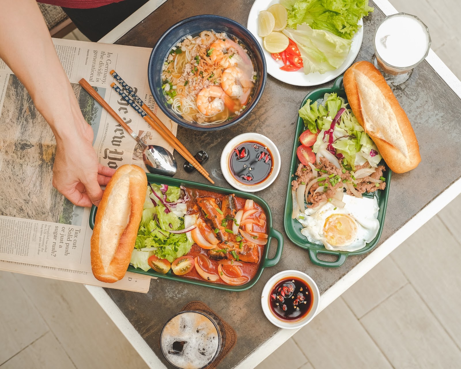 Pan bread sets and noodles on a wood table