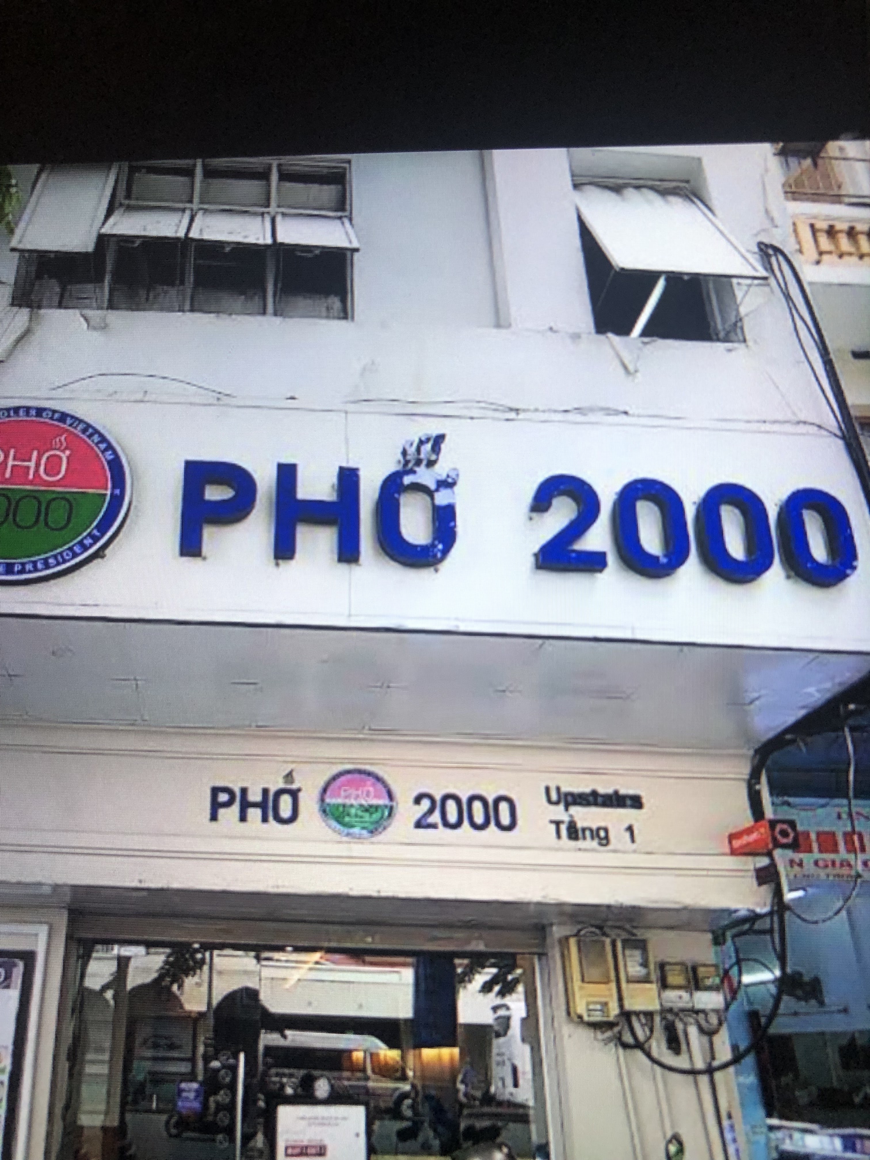 Pho 2000 storefront with blue neon letters
