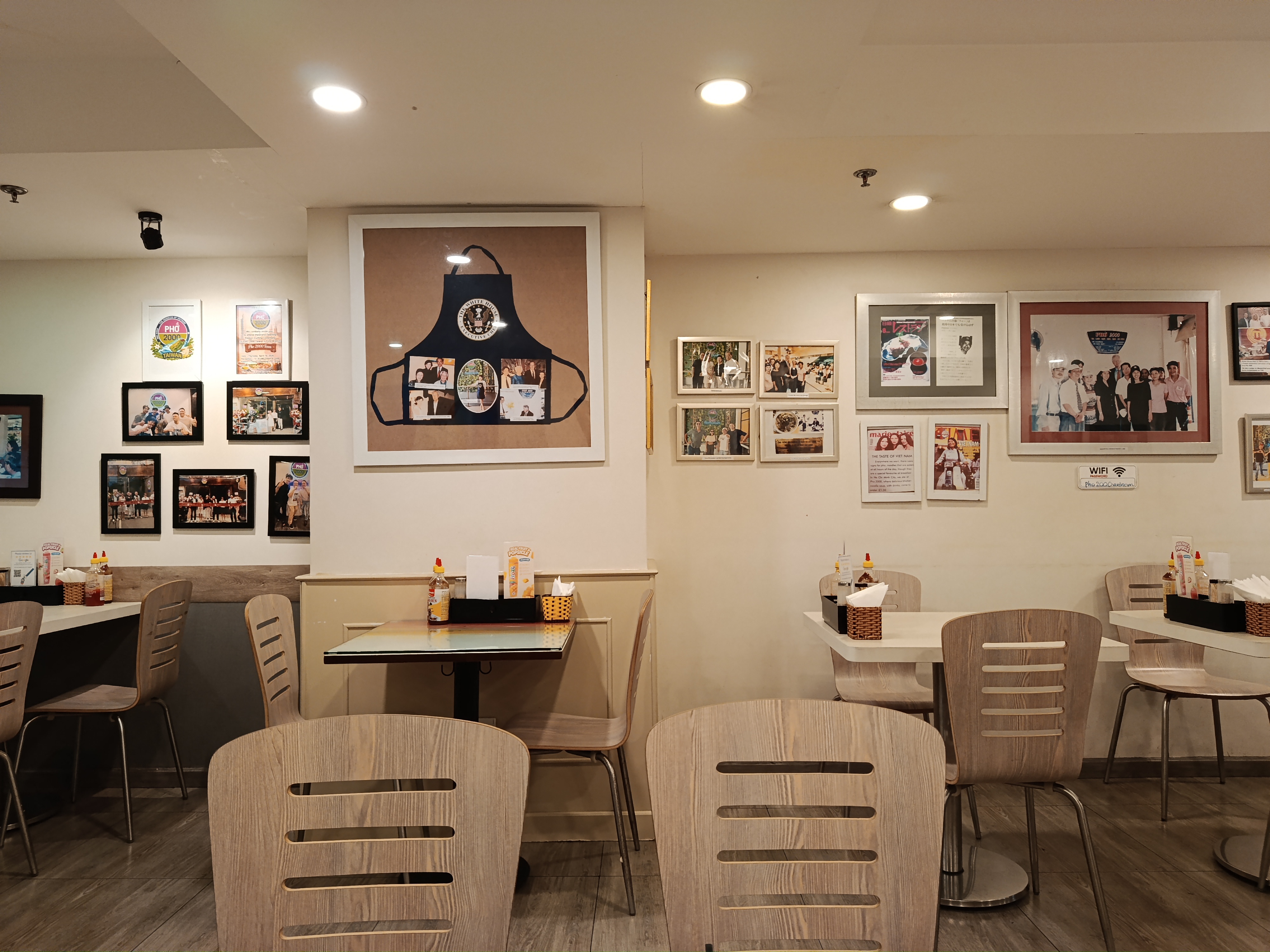 The framed White House apron on the wall at Pho 2000