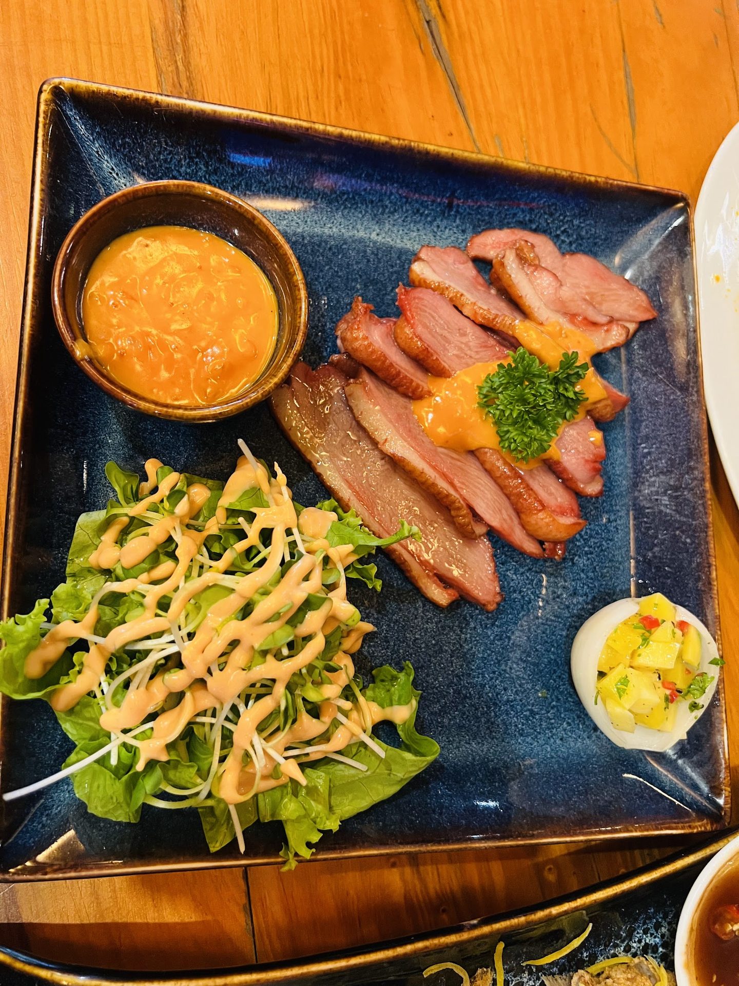 Sliced cold cuts with salad