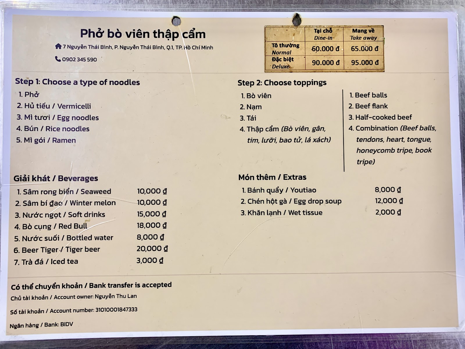 The laminated price board on the Pho Bo Vien Thap Cam cart
