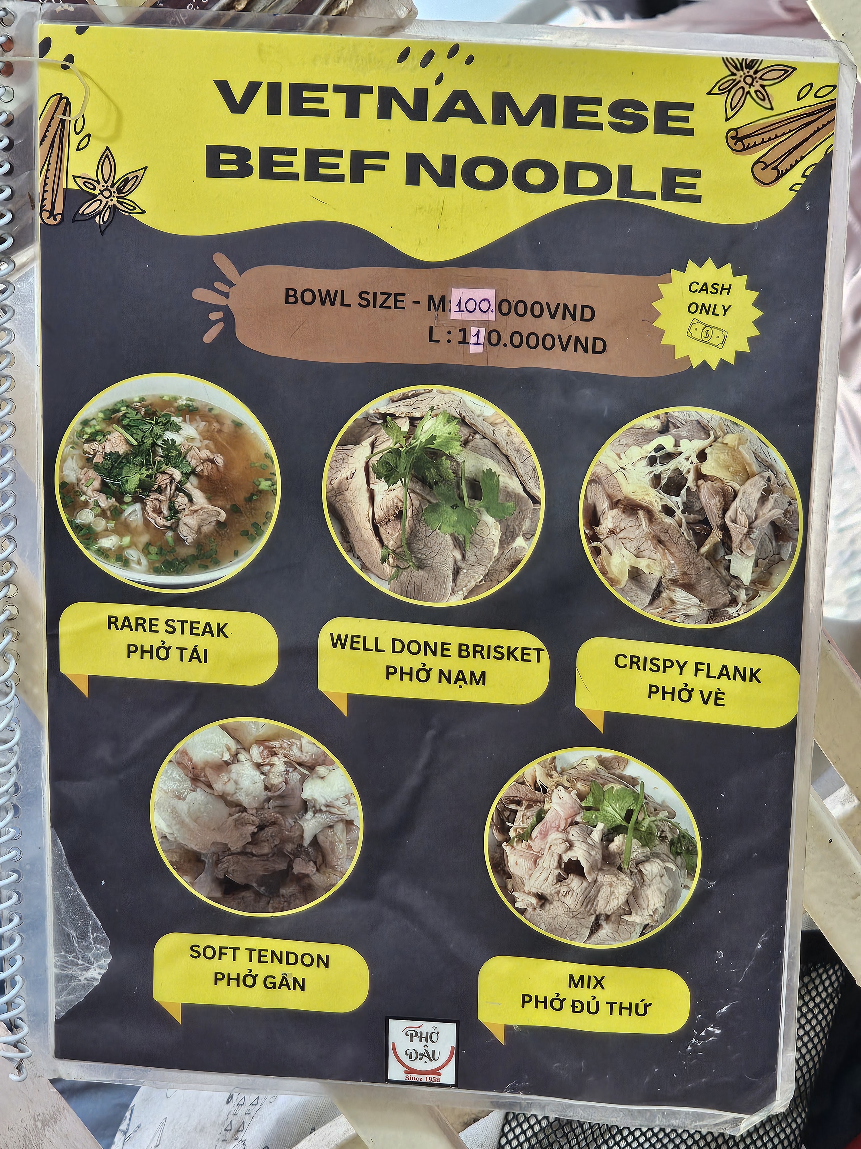 The menu board at Pho Dau