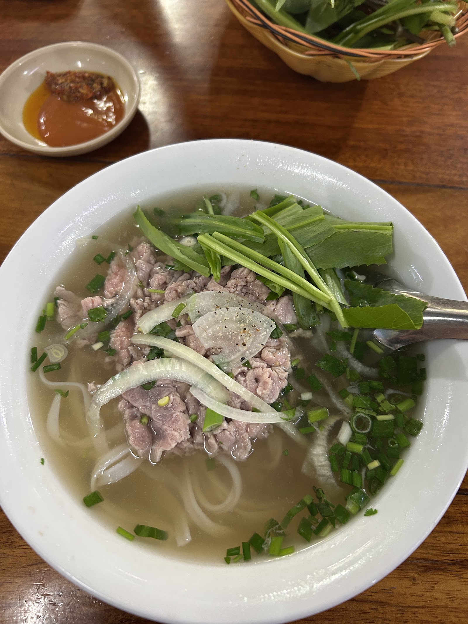 Pho bowl with fresh herbs — photo from Google Maps