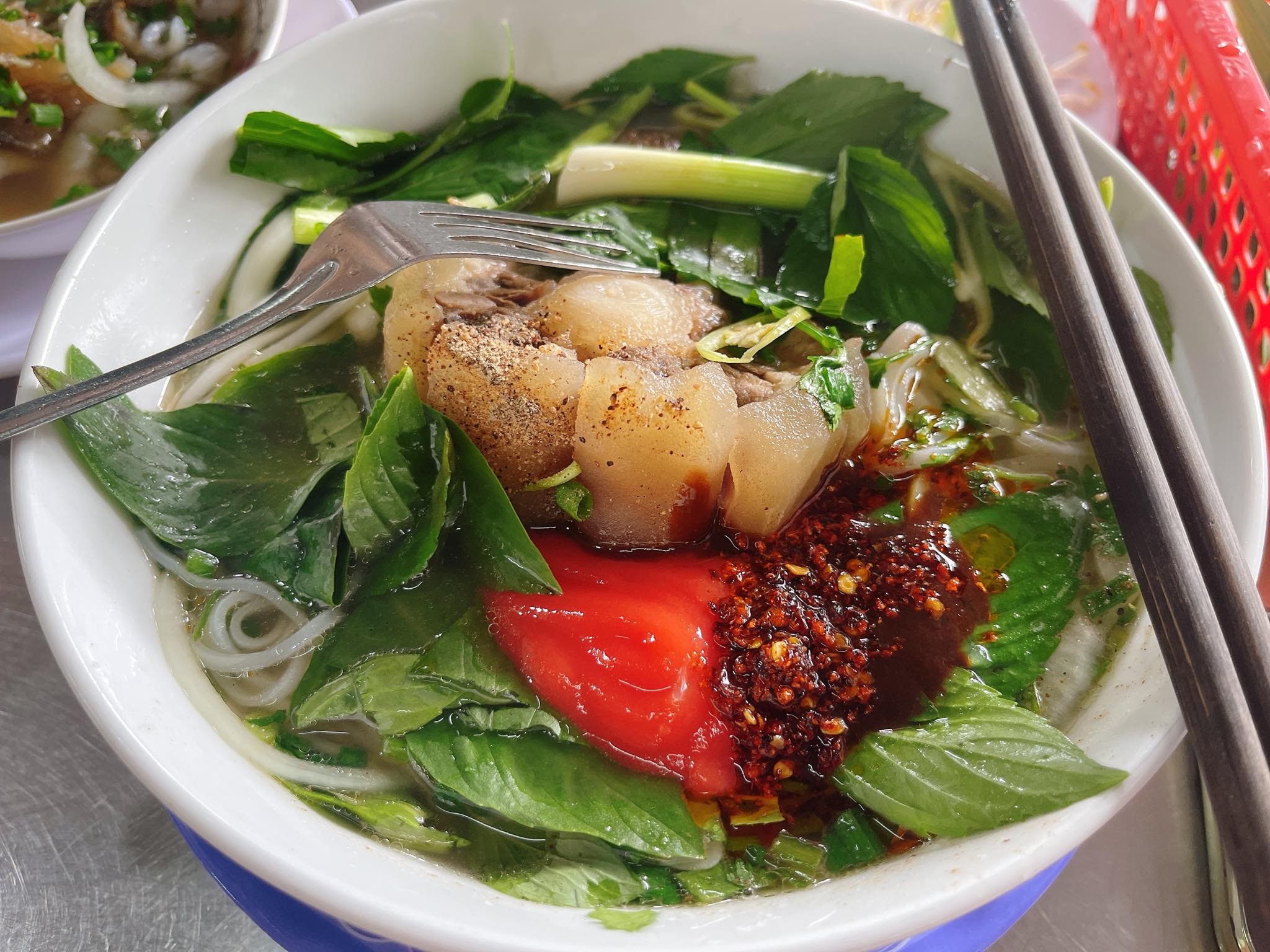 Oxtail and tendon close-up in a Phở Phượng bowl