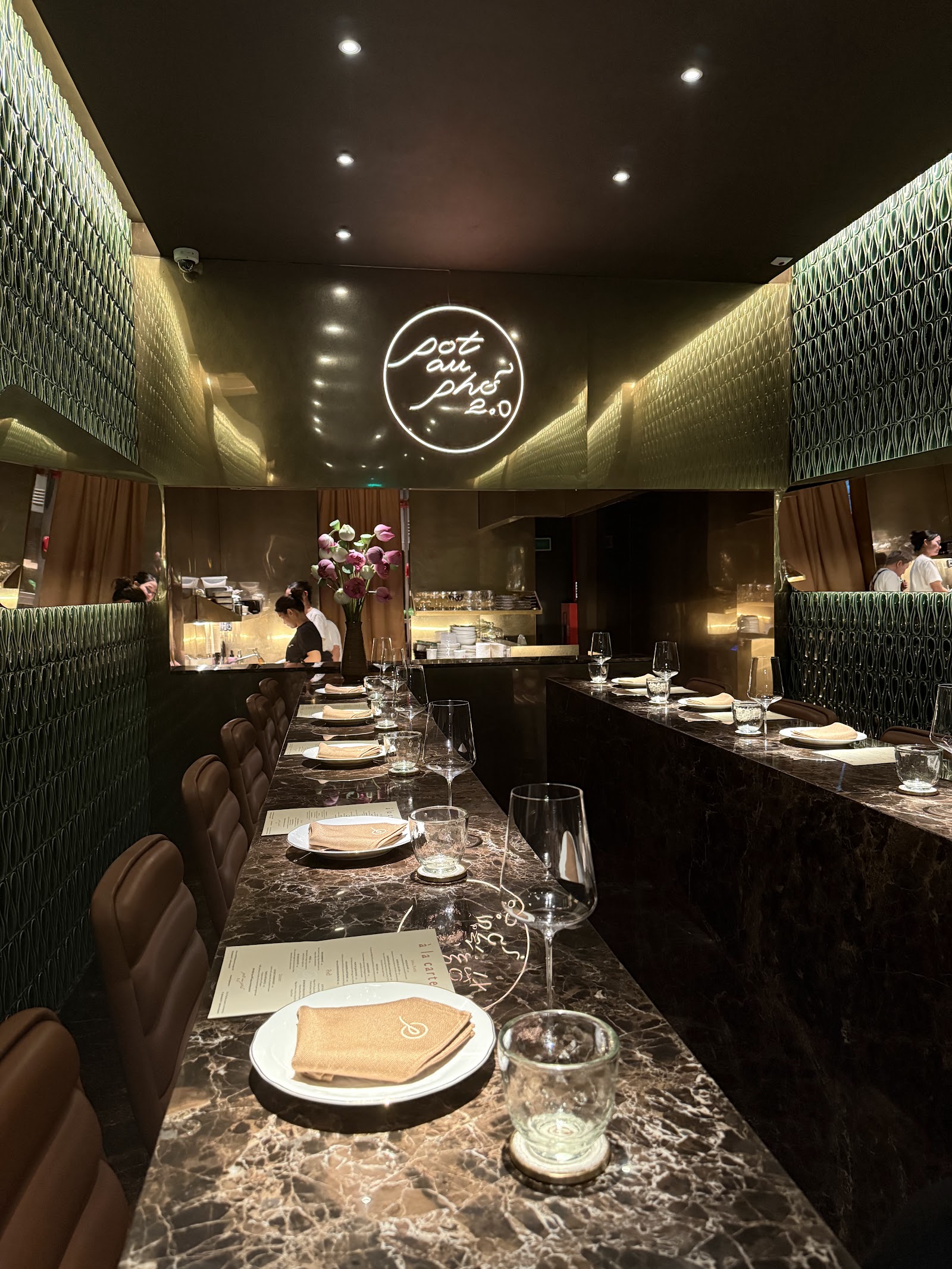 Pot Au Phở 2.0 dining room with the neon sign