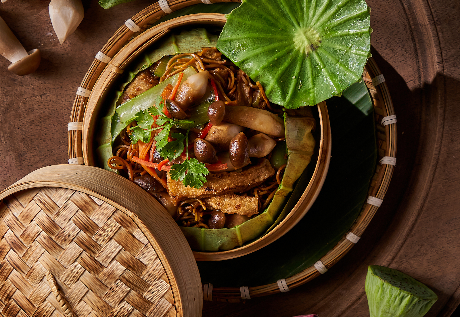 Vegetarian noodles in a bamboo steamer