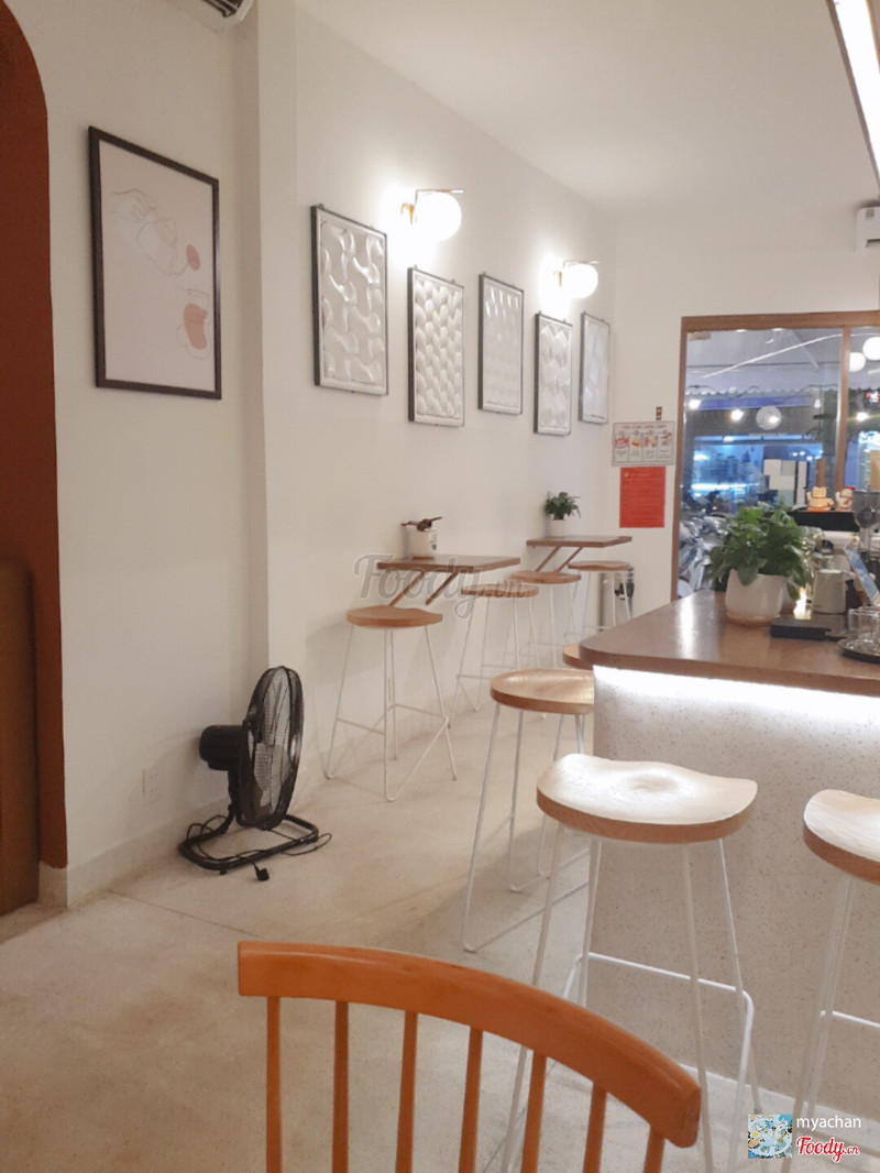 The bar-side wall with stools