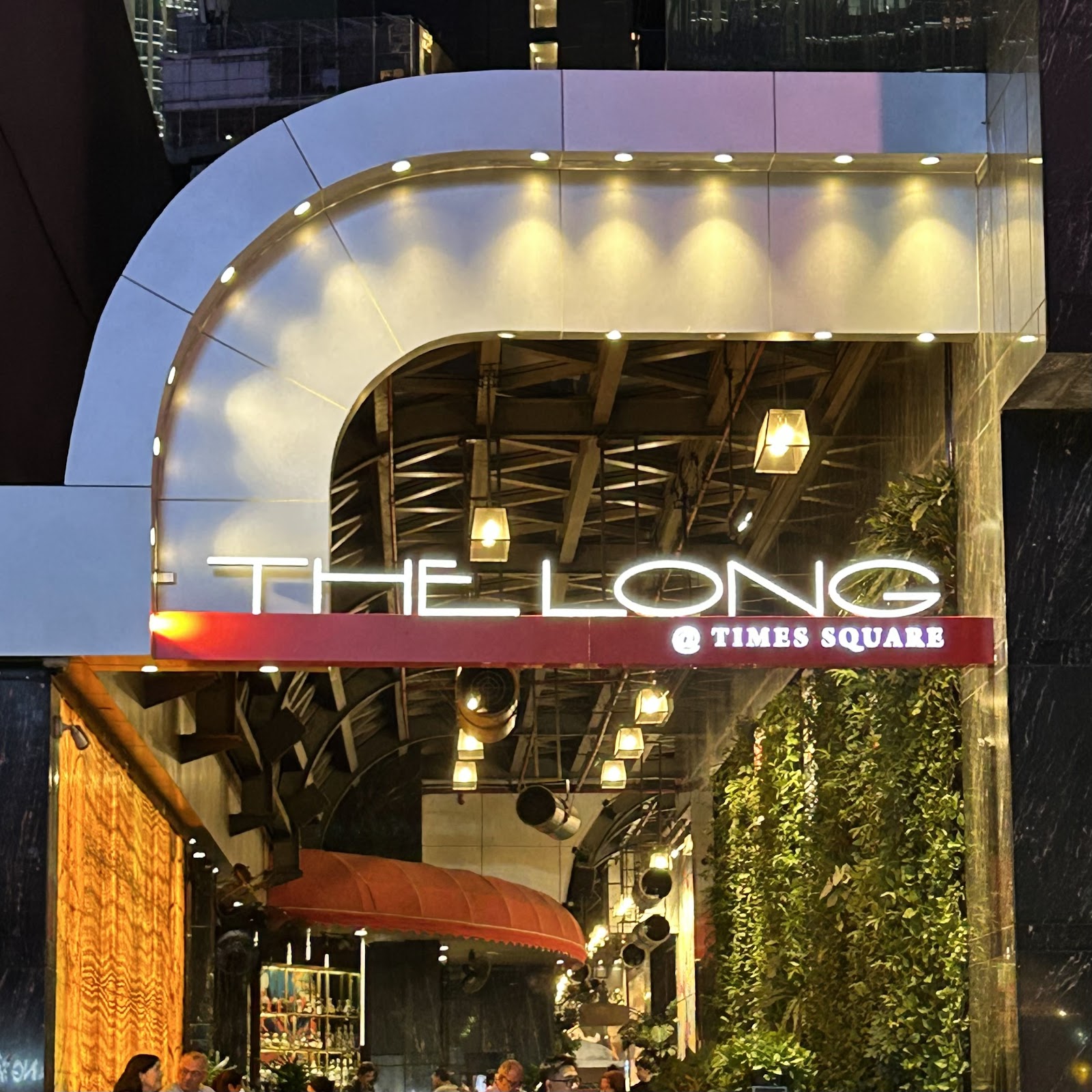 The night entrance of The Long @ Times Square on Nguyen Hue