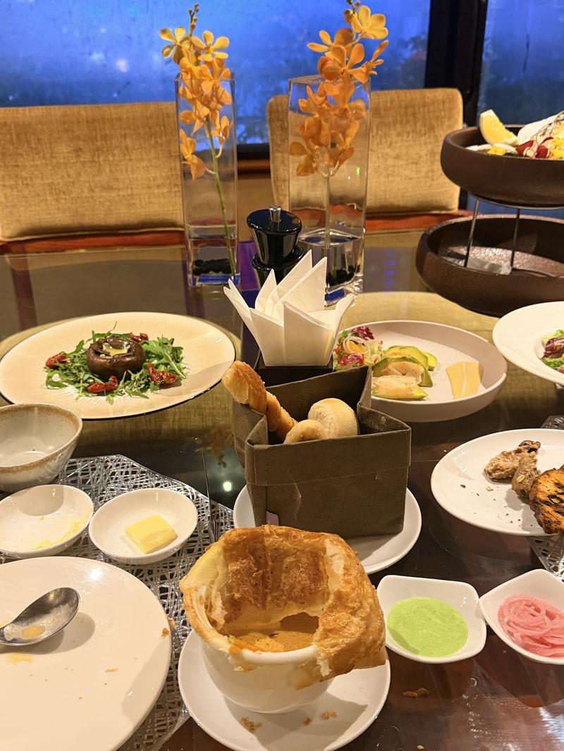 Evening table: soup dumpling, bread, salads
