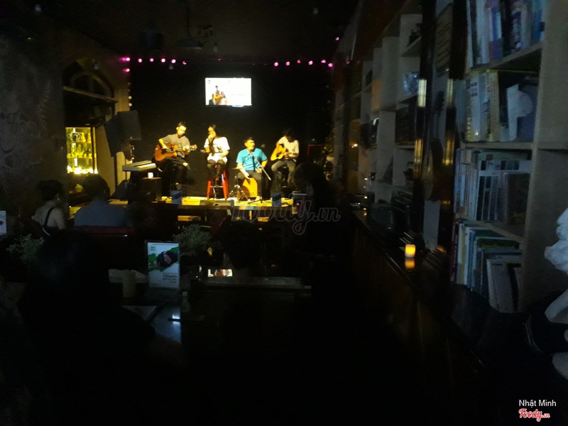 A band performing on the small stage